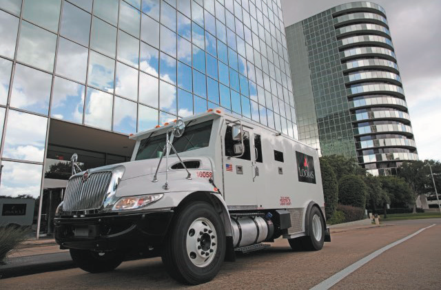 Photo of armored truck with loomis logo on side