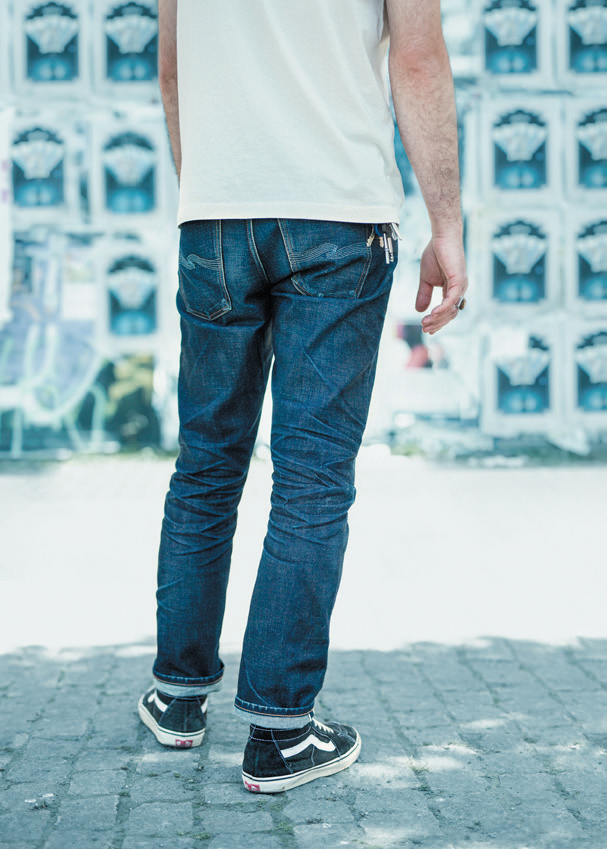 Photo of man using nudie jeans